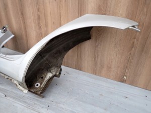 TOYOTA YARIS II 06-11 PRÓG LEWY RANT BŁOTNIKA 7/10 MINIATURA