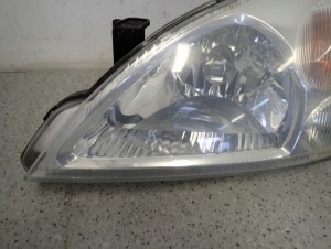 SUZUKI LIANA 01-07 LAMPA PRZEDNIA LEWA 3/8 MINIATURA