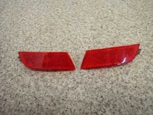 NISSAN NOTE E11 06-12 ODBLASK ZDERZAKA TYLNY 1/5 MINIATURA