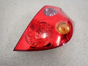 KIA CEED HATCHBACK 07-09 LAMPA TYLNA PRAWA 1/7 MINIATURA