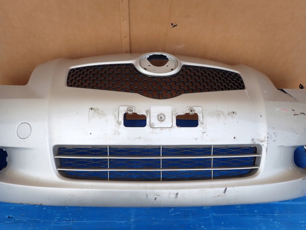 TOYOTA YARIS II 06-09 ZDERZAK PRZEDNI 1E7 6/16