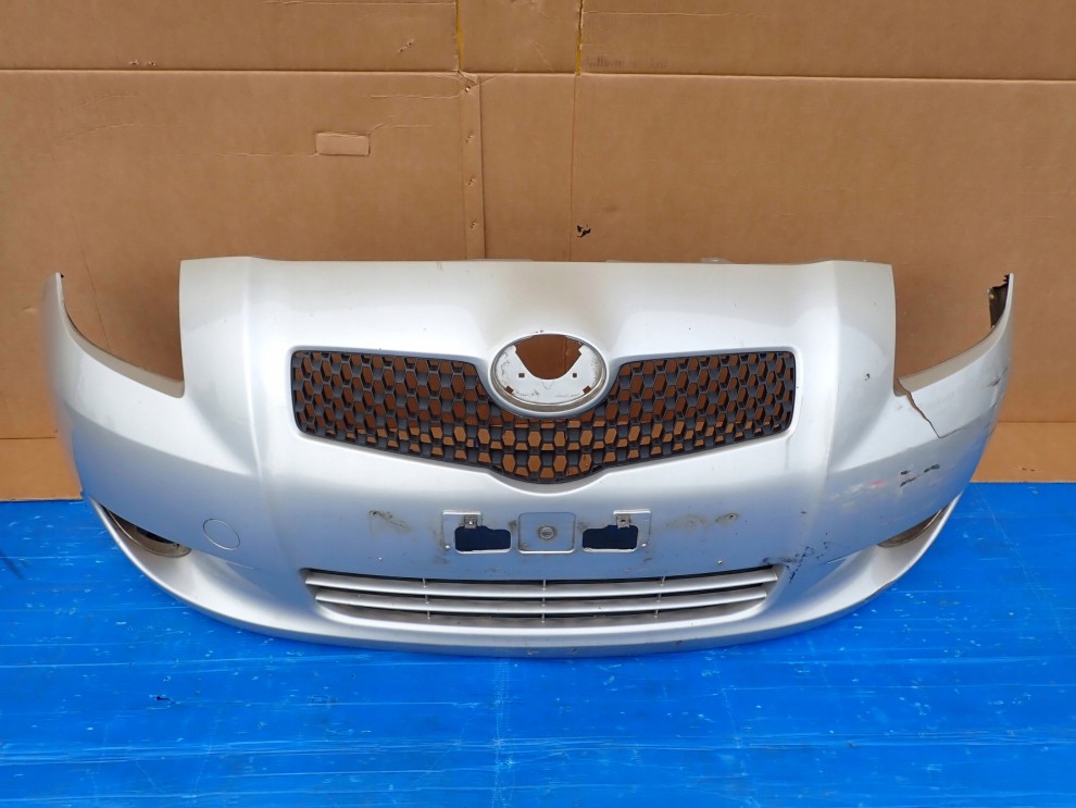 TOYOTA YARIS II 06-09 ZDERZAK PRZEDNI 1E7 12/16