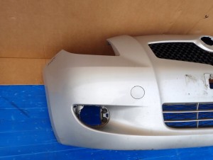 TOYOTA YARIS II 06-09 ZDERZAK PRZEDNI 1E7 7/16 MINIATURA