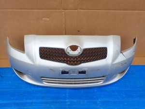 TOYOTA YARIS II 06-09 ZDERZAK PRZEDNI 1E7 12/16 MINIATURA