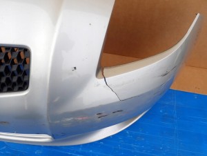 TOYOTA YARIS II 06-09 ZDERZAK PRZEDNI 1E7 13/16 MINIATURA