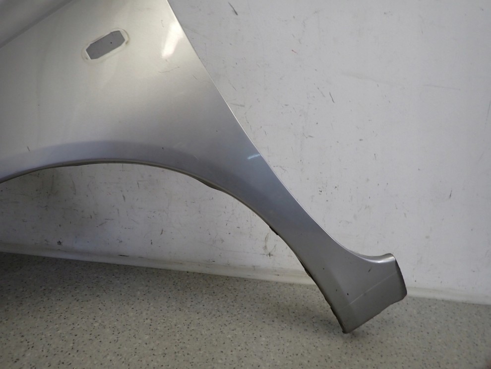 NISSAN MICRA K12 03-09 BŁOTNIK PRZEDNI LEWY KY0 2/13