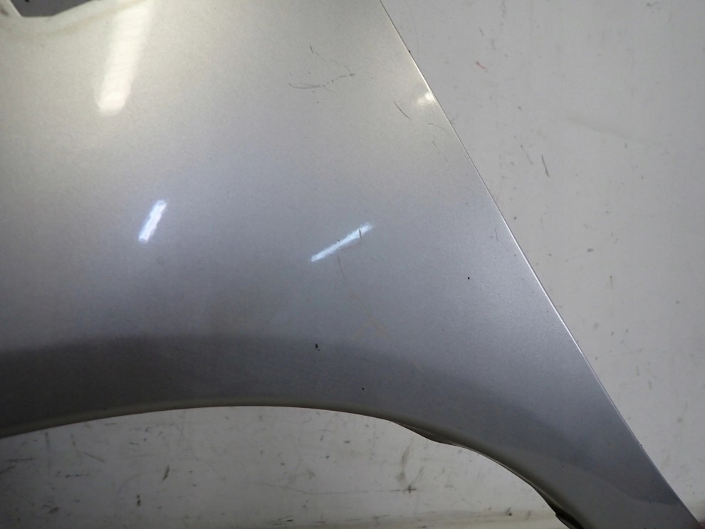 NISSAN MICRA K12 03-09 BŁOTNIK PRZEDNI LEWY KY0 3/13