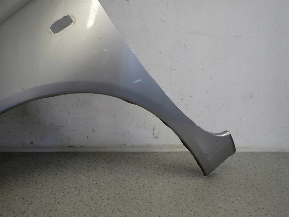 NISSAN MICRA K12 03-09 BŁOTNIK PRZEDNI LEWY KY0 7/13