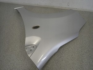 SUZUKI ALTO NISSAN PIXO 09-14 BŁOTNIK PRZEDNI LEWY Z2S 5/9 MINIATURA