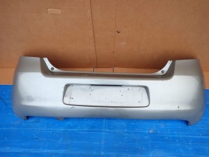 TOYOTA YARIS II 06-09 ZDERZAK TYLNY 1F8