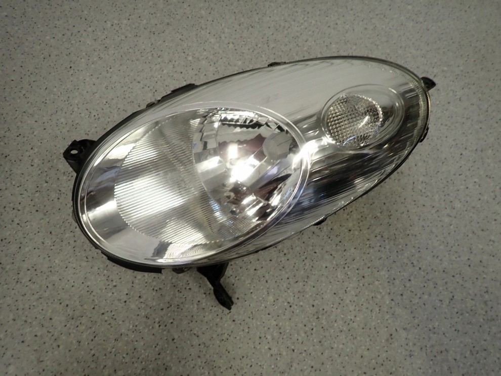 NISSAN MICRA K12 03-07 REFLEKTOR LEWY LAMPA PRZÓD 4/9