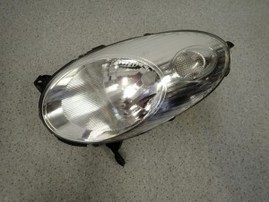 NISSAN MICRA K12 03-07 REFLEKTOR LEWY LAMPA PRZÓD 4/9 MINIATURA