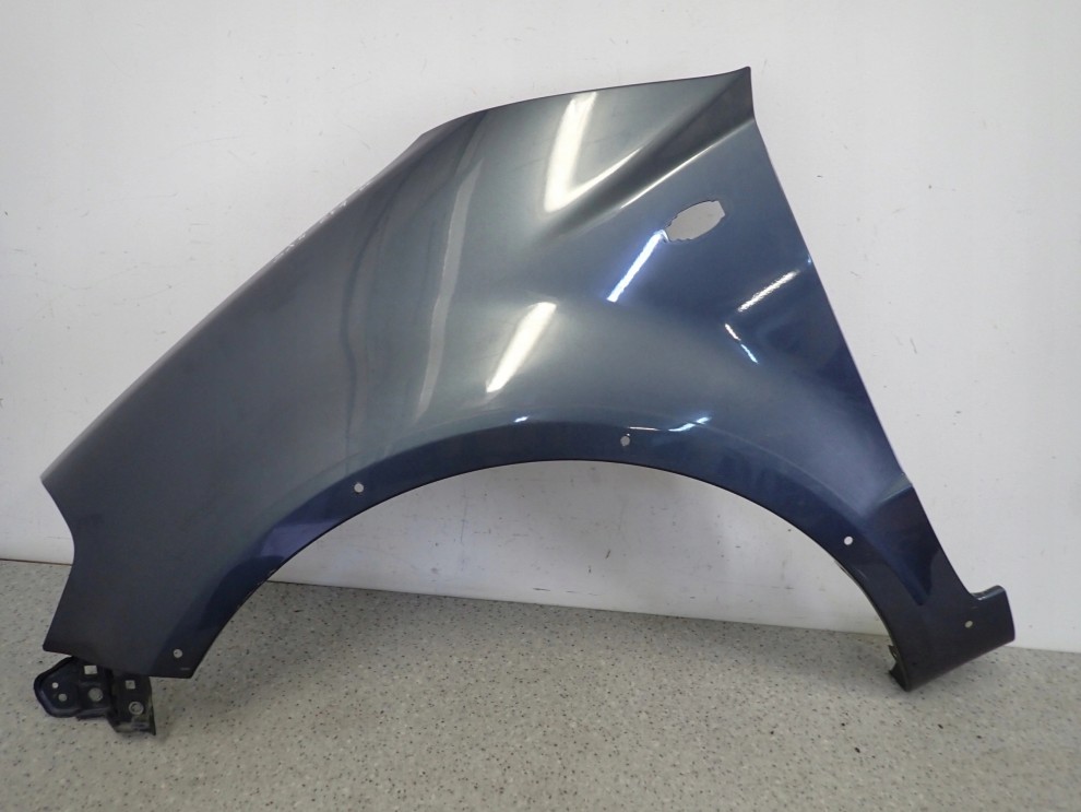 SUZUKI SX4 06-12 BŁOTNIK PRZEDNI LEWY ZY4 1/12