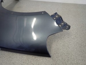 SUZUKI SX4 06-12 BŁOTNIK PRZEDNI LEWY ZY4 7/12 MINIATURA