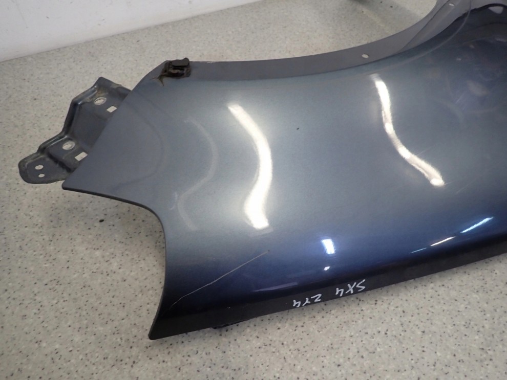 SUZUKI SX4 06-12 BŁOTNIK PRZEDNI PRAWY ZY4 7/11