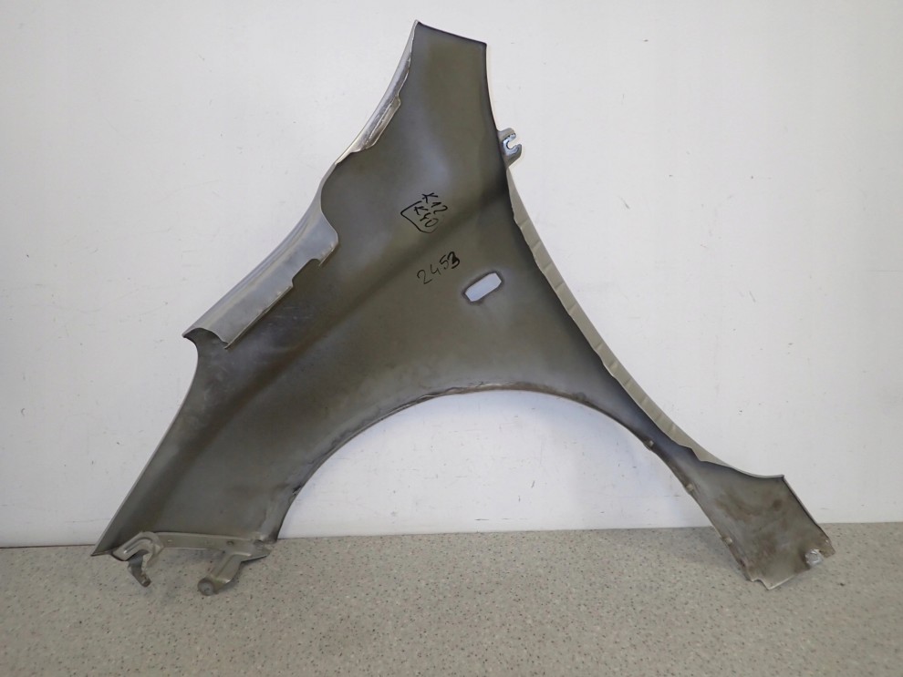 NISSAN MICRA K12 03-09 BŁOTNIK PRZEDNI PRAWY KY0 9/11