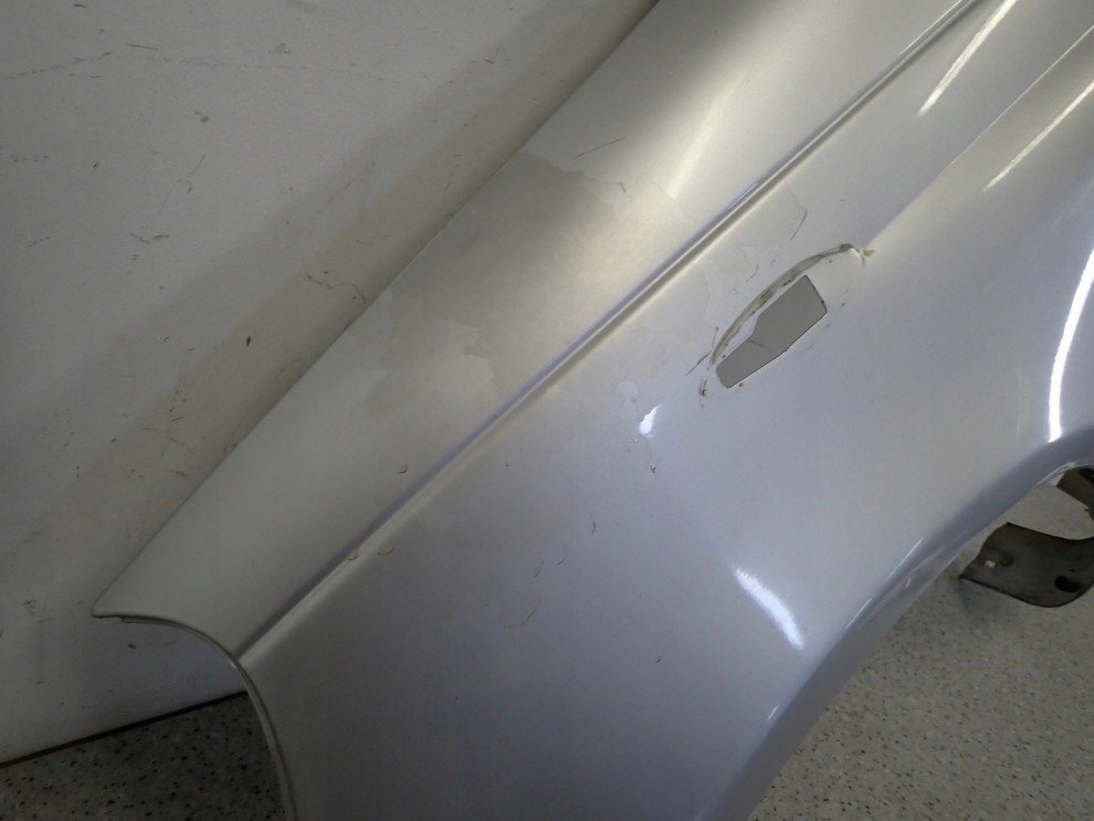 TOYOTA YARIS I 99-05 BŁOTNIK PRZEDNI LEWY 1E7 4/11