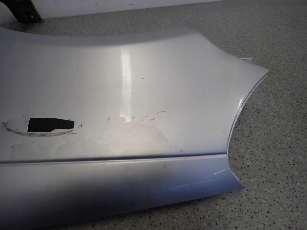 TOYOTA YARIS I 99-05 BŁOTNIK PRZEDNI LEWY 1E7 6/11