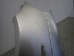 TOYOTA YARIS I 99-05 BŁOTNIK PRZEDNI LEWY 1E7 8/11 MINIATURA