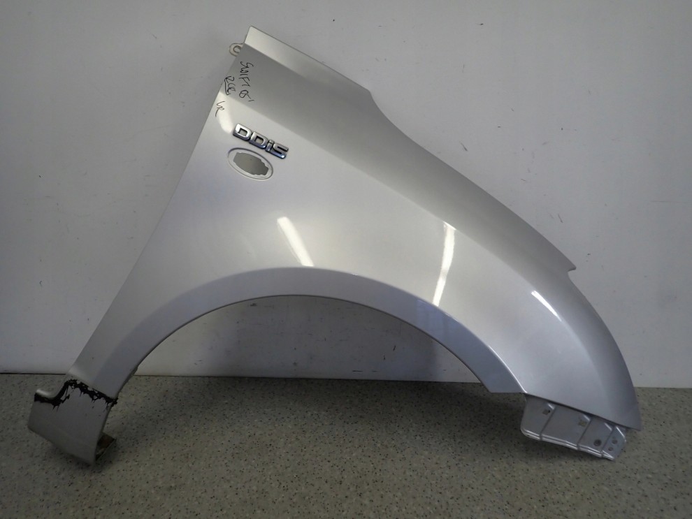 SUZUKI SWIFT III MK6 05-10 BŁOTNIK PRZEDNI PRAWY ZCC 1/13