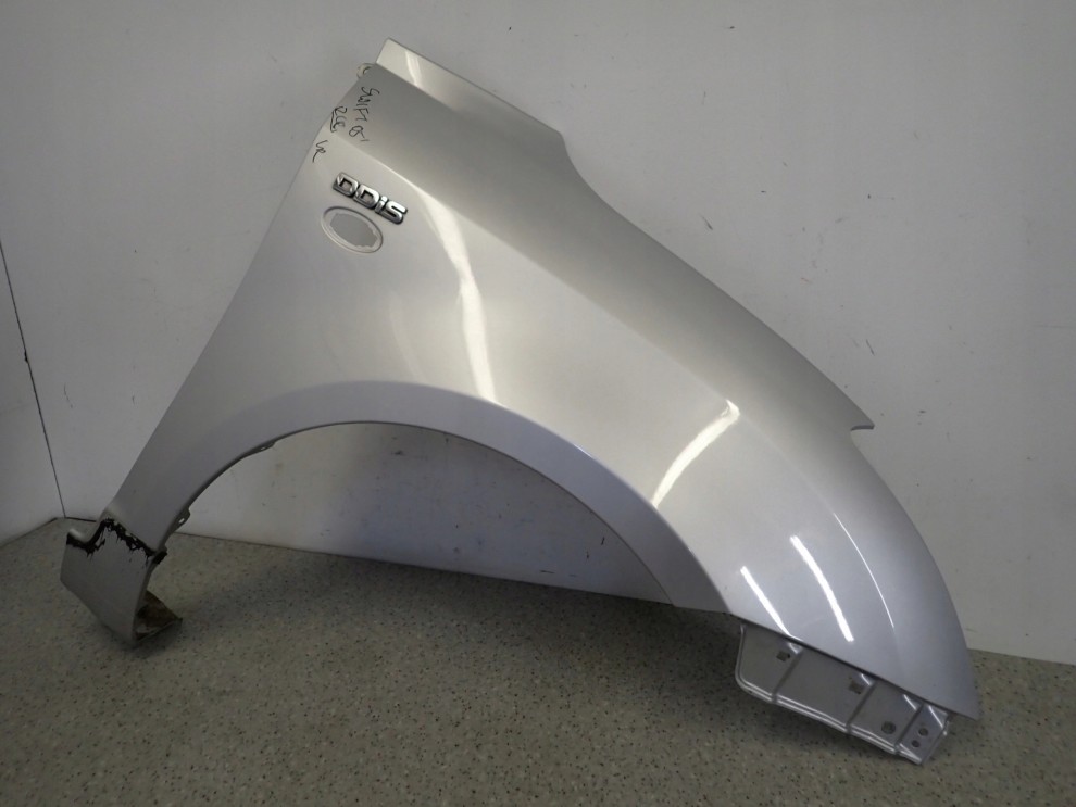 SUZUKI SWIFT III MK6 05-10 BŁOTNIK PRZEDNI PRAWY ZCC 2/13