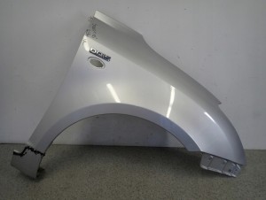 SUZUKI SWIFT III MK6 05-10 BŁOTNIK PRZEDNI PRAWY ZCC