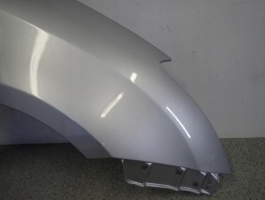 SUZUKI SWIFT III MK6 05-10 BŁOTNIK PRZEDNI PRAWY ZCC 3/13 MINIATURA