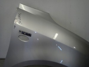 SUZUKI SWIFT III MK6 05-10 BŁOTNIK PRZEDNI PRAWY ZCC 4/13 MINIATURA