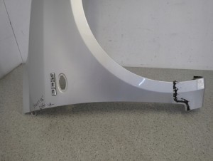 SUZUKI SWIFT III MK6 05-10 BŁOTNIK PRZEDNI PRAWY ZCC 9/13 MINIATURA