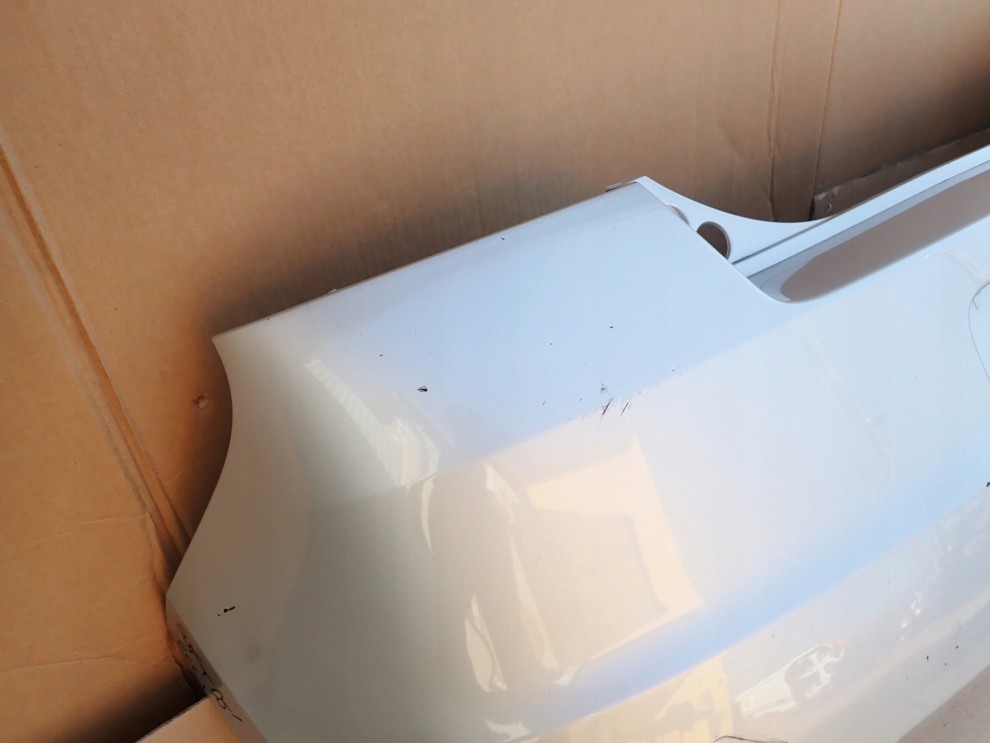 SUZUKI SWIFT IV MK6 05-07 ZDERZAK TYLNY ZCC 5/15