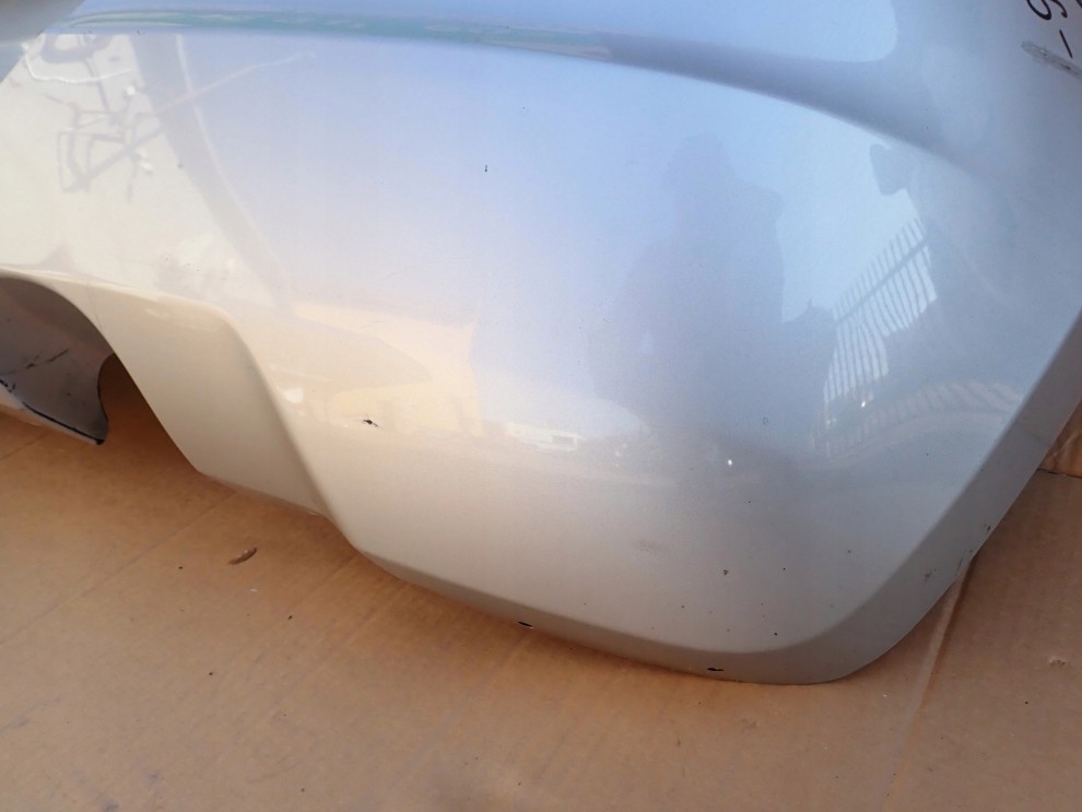 SUZUKI SWIFT IV MK6 05-07 ZDERZAK TYLNY ZCC 11/15
