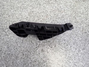 SUZUKI SWIFT MK7 10- ŚLIZG ZDERZAKA PRZEDNI LEWY 4/4 MINIATURA