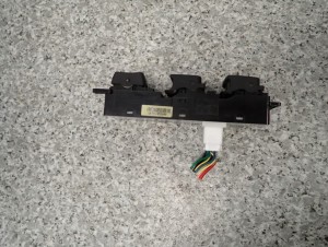 KIA CARENS III 06- PANEL STEROWANIA SZYB PRZEDNI LEWY 3/5 MINIATURA