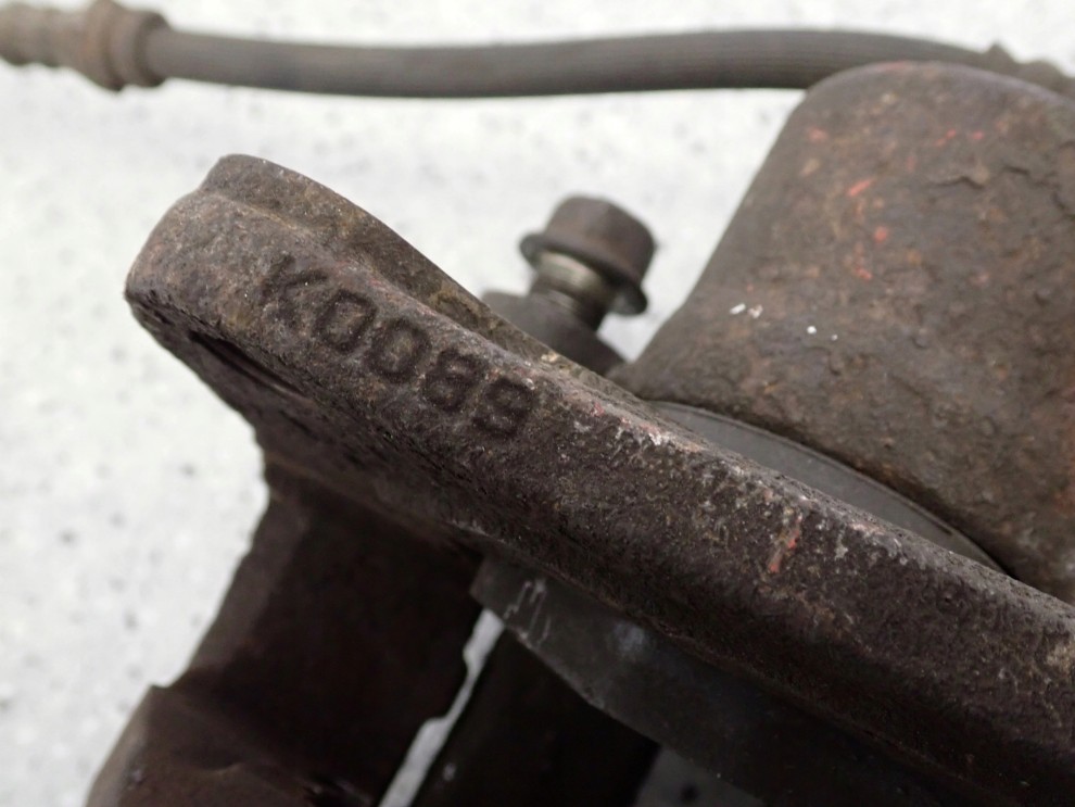 MAZDA CX7 CX-7 09- ZACISK HAMULCOWY PRZEDNI LEWY 4/5