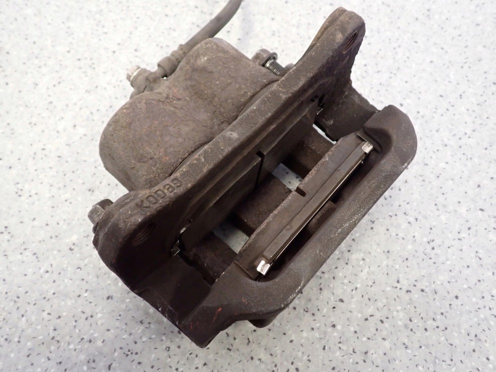 MAZDA CX7 CX-7 09- ZACISK HAMULCOWY PRZEDNI PRAWY 5/7