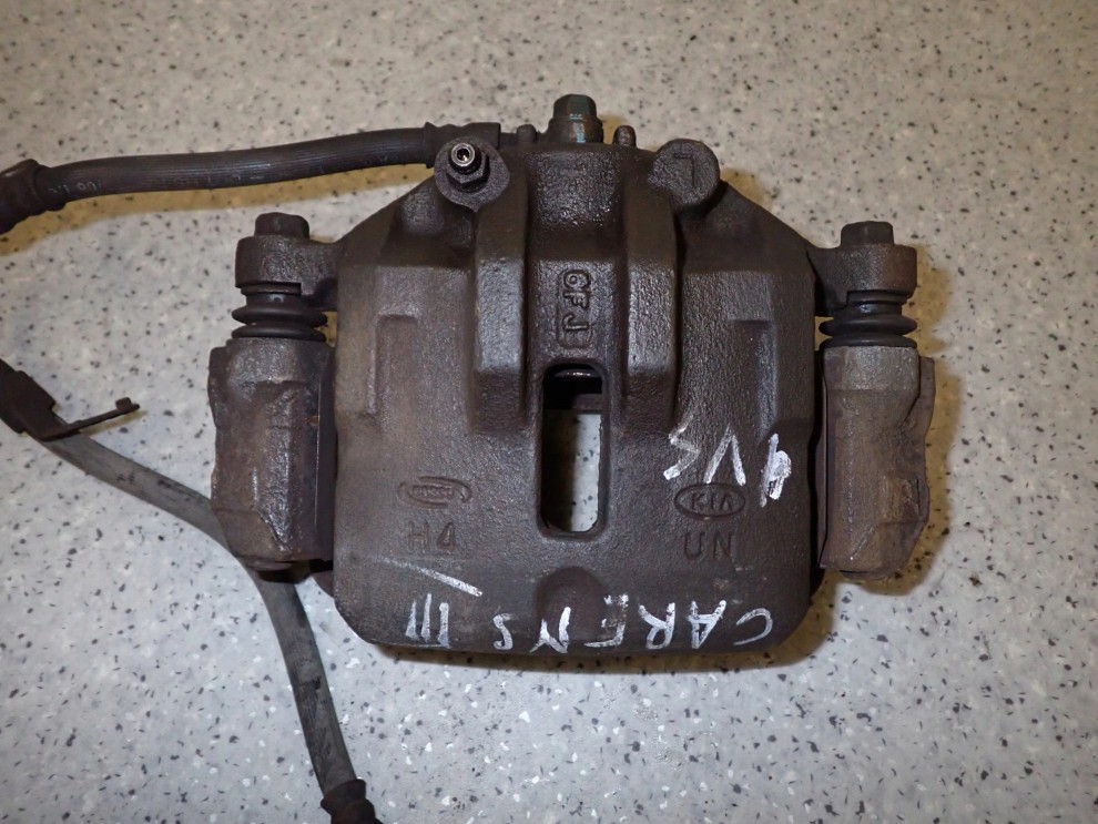 KIA CARENS III 06-11 ZACISK HAMULCOWY PRZEDNI LEWY 2/3