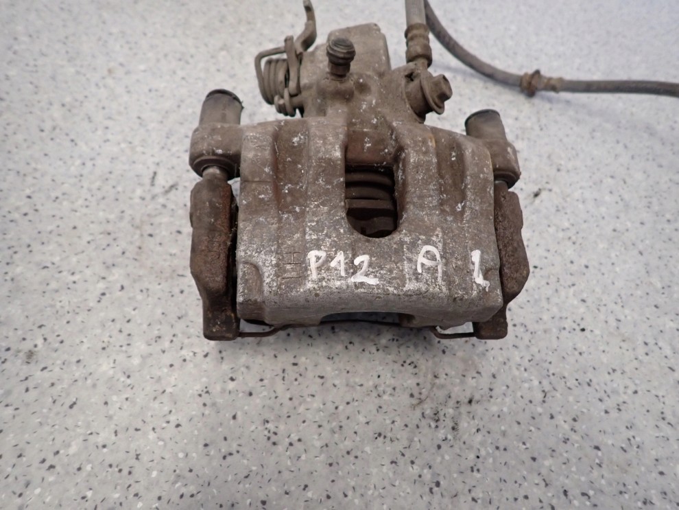 PRIMERA P12 02-07 ZACISK HAMULCOWY TYLNY LEWY 2/6