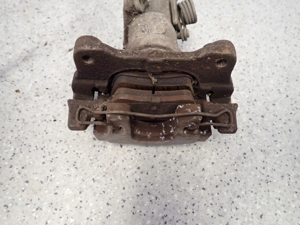 PRIMERA P12 02-07 ZACISK HAMULCOWY TYLNY LEWY 6/6