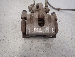 PRIMERA P12 02-07 ZACISK HAMULCOWY TYLNY LEWY 2/6 MINIATURA