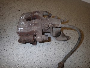 PRIMERA P12 02-07 ZACISK HAMULCOWY TYLNY LEWY 4/6 MINIATURA