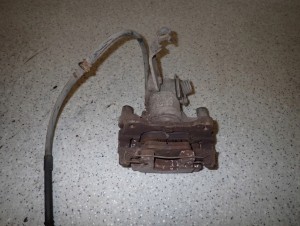 PRIMERA P12 02-07 ZACISK HAMULCOWY TYLNY LEWY 5/6 MINIATURA