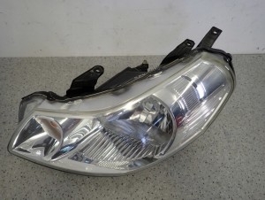 SUZUKI SX4 FIAT SEDICI 06-13 LAMPA PRZEDNIA LEWA REFLEKTOR 6/10 MINIATURA