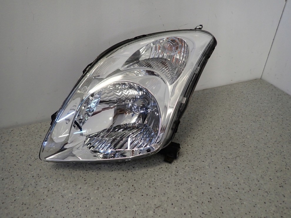 SUZUKI SWIFT 05-09 REFLEKTOR LEWY LAMPA PRZEDNIA 1/8