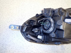 NISSAN MICRA K12 06-08 REFLEKTOR LEWY LAMPA PRZEDNIA 8/10 MINIATURA