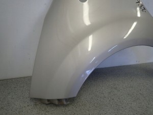 KIA VENGA 09- BŁOTNIK PRZEDNI LEWY QU 3/16 MINIATURA