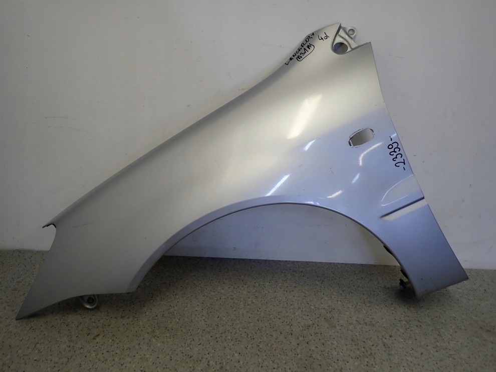 MITSUBISHI LANCER VII 04- BŁOTNIK PRZEDNI LEWY A31A 1/13
