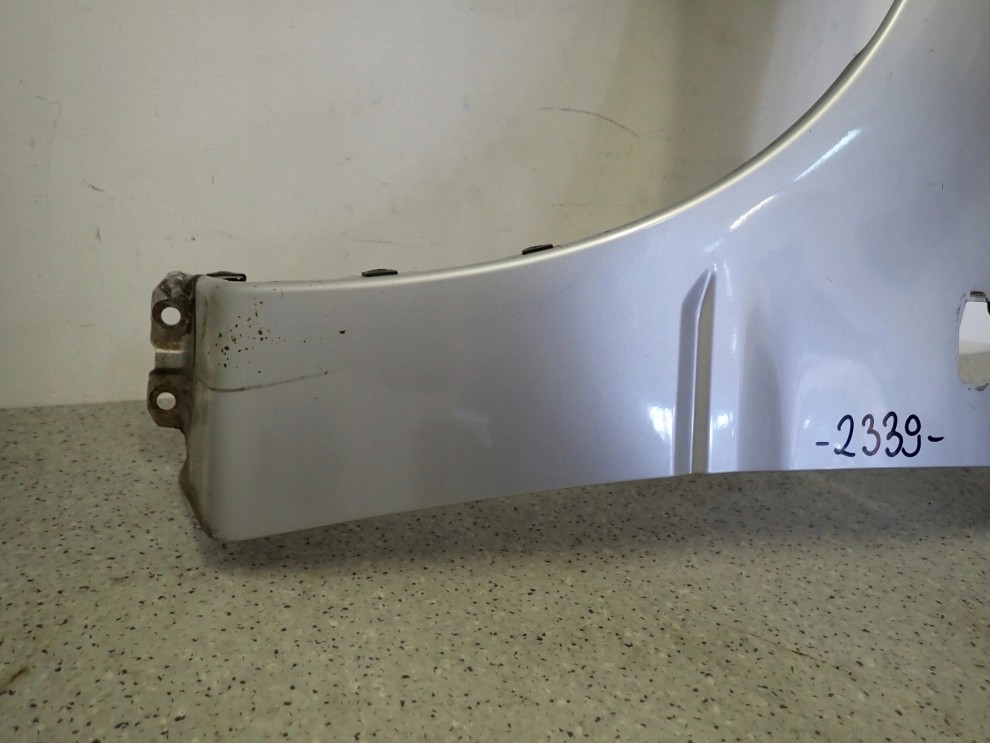MITSUBISHI LANCER VII 04- BŁOTNIK PRZEDNI LEWY A31A 12/13