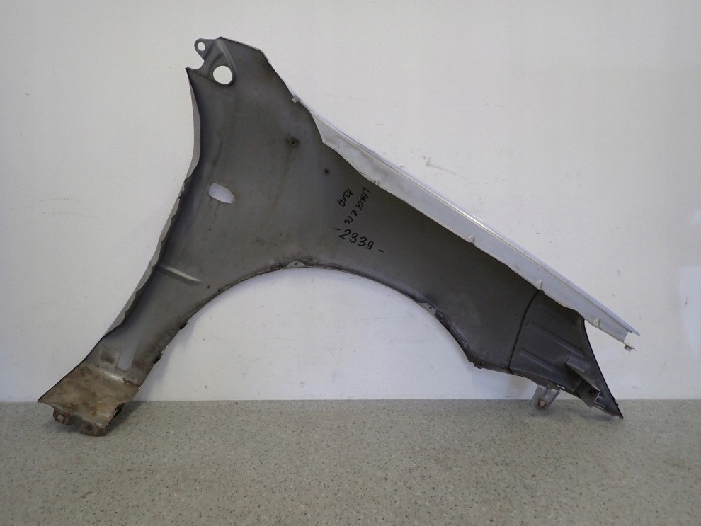 MITSUBISHI LANCER VII 04- BŁOTNIK PRZEDNI LEWY A31A 13/13