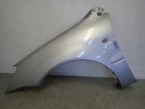 MITSUBISHI LANCER VII 04- BŁOTNIK PRZEDNI LEWY A31A