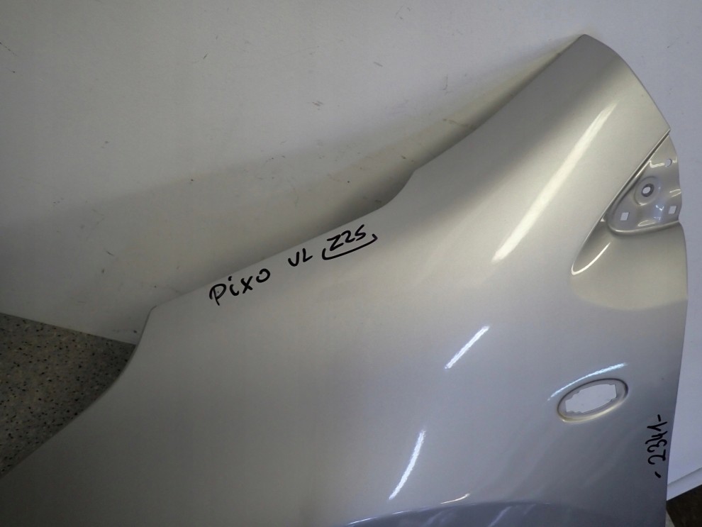 NISSAN PIXO 09- BŁOTNIK PRZEDNI LEWY Z2S 4/14